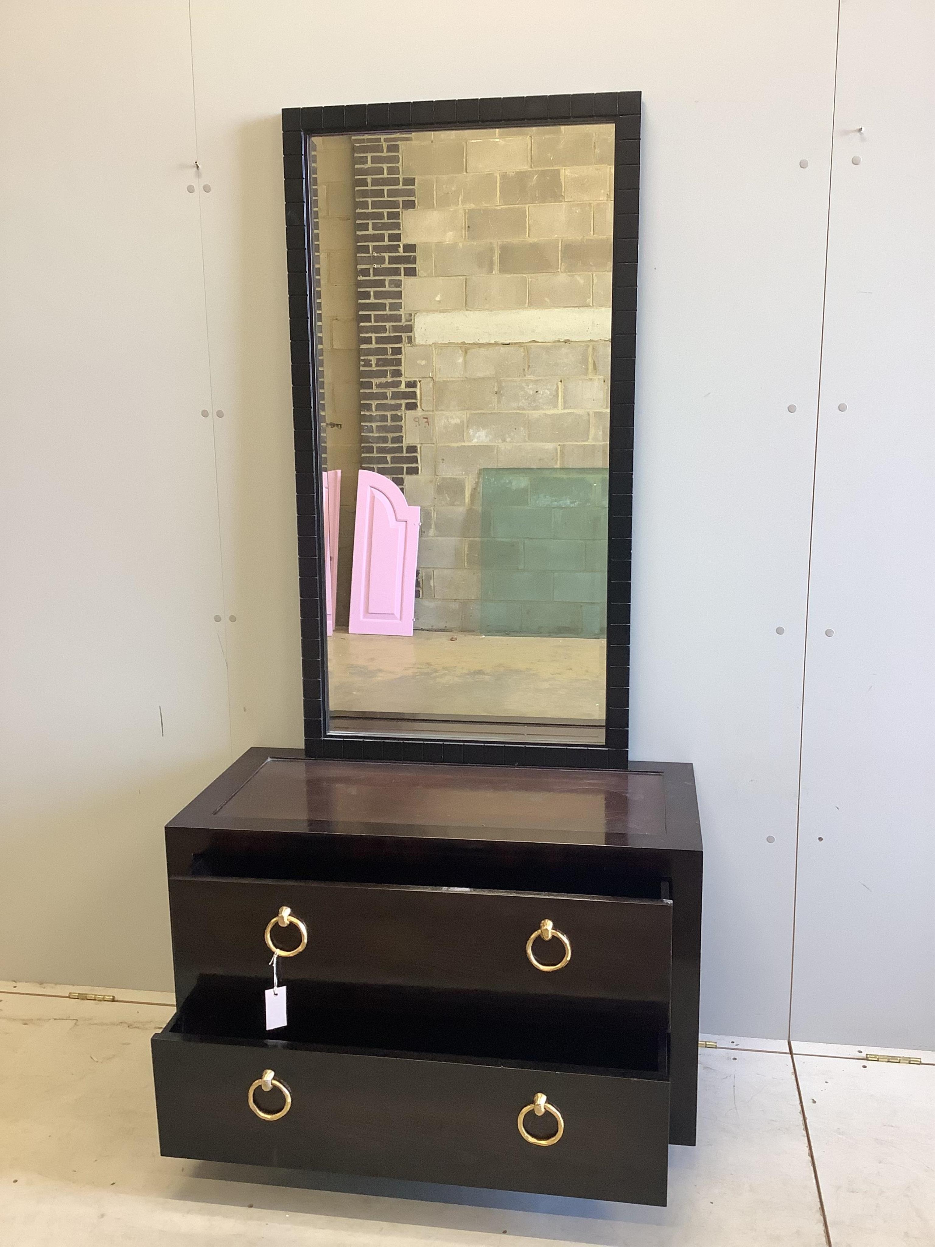 A James Martin low chest, width 95cm, depth 45cm, height 61cm together with a mirror. Condition - fair to good